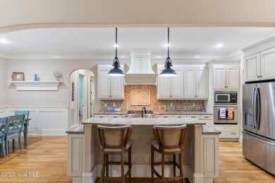 This immaculate custom-built home is a shining example of on Reserve Club At St James Plantation in North Carolina - for sale on GolfHomes.com, golf home, golf lot