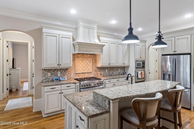 This immaculate custom-built home is a shining example of on Reserve Club At St James Plantation in North Carolina - for sale on GolfHomes.com, golf home, golf lot