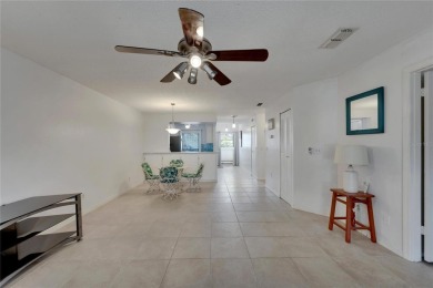 Under contract-accepting backup offers. Price Improvement! The on Kings Point Executive Golf Course in Florida - for sale on GolfHomes.com, golf home, golf lot