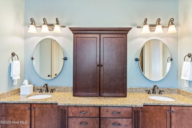 This immaculate custom-built home is a shining example of on Reserve Club At St James Plantation in North Carolina - for sale on GolfHomes.com, golf home, golf lot