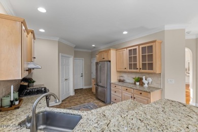 Welcome a stunning 3,185 sq ft custom-built, brick home on a on Olde Point Golf and Country Club in North Carolina - for sale on GolfHomes.com, golf home, golf lot
