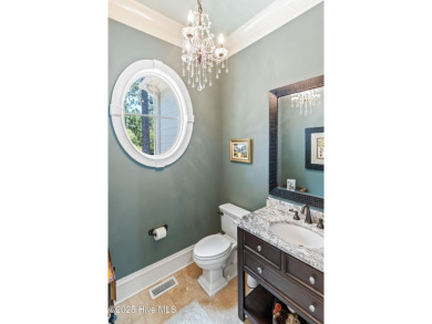 This immaculate custom-built home is a shining example of on Reserve Club At St James Plantation in North Carolina - for sale on GolfHomes.com, golf home, golf lot