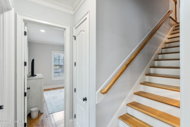 This immaculate custom-built home is a shining example of on Reserve Club At St James Plantation in North Carolina - for sale on GolfHomes.com, golf home, golf lot