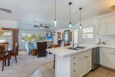 This beautifully decorated 'Hawaiiana-style' 3BR/3BA upstairs on Makai Golf Club At Princeville in Hawaii - for sale on GolfHomes.com, golf home, golf lot