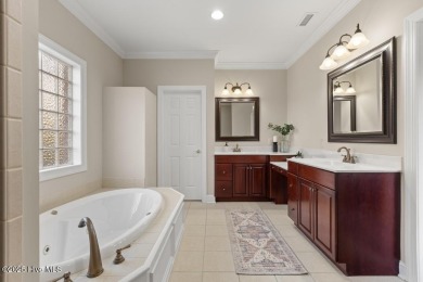 Welcome a stunning 3,185 sq ft custom-built, brick home on a on Olde Point Golf and Country Club in North Carolina - for sale on GolfHomes.com, golf home, golf lot