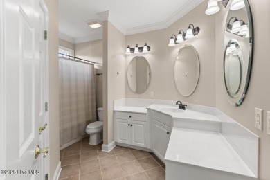 Welcome a stunning 3,185 sq ft custom-built, brick home on a on Olde Point Golf and Country Club in North Carolina - for sale on GolfHomes.com, golf home, golf lot