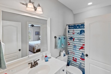 This immaculate custom-built home is a shining example of on Reserve Club At St James Plantation in North Carolina - for sale on GolfHomes.com, golf home, golf lot