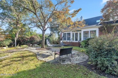 Welcome a stunning 3,185 sq ft custom-built, brick home on a on Olde Point Golf and Country Club in North Carolina - for sale on GolfHomes.com, golf home, golf lot