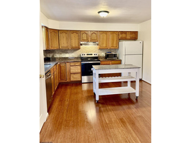 Well kept townhome in convenient location. Large Primary bedroom on Bel Meadow Country Club in West Virginia - for sale on GolfHomes.com, golf home, golf lot