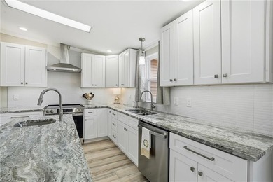 Freshly remodeled from top to bottom, this light-filled home on Pine Lakes Country Club in Florida - for sale on GolfHomes.com, golf home, golf lot