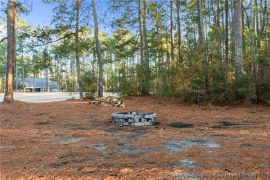 Golf-front elegance meets resort-style living in this on Deercroft Golf and Country Club in North Carolina - for sale on GolfHomes.com, golf home, golf lot