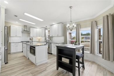 Freshly remodeled from top to bottom, this light-filled home on Pine Lakes Country Club in Florida - for sale on GolfHomes.com, golf home, golf lot