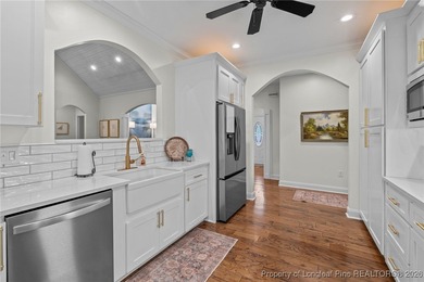 Golf-front elegance meets resort-style living in this on Deercroft Golf and Country Club in North Carolina - for sale on GolfHomes.com, golf home, golf lot