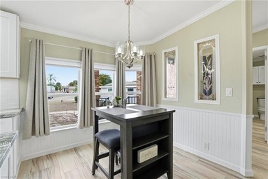 Freshly remodeled from top to bottom, this light-filled home on Pine Lakes Country Club in Florida - for sale on GolfHomes.com, golf home, golf lot