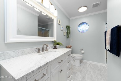 Waterfront living at its finest! This beautiful home offers on River Bend Golf and Country Club in North Carolina - for sale on GolfHomes.com, golf home, golf lot