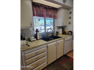 REDUCED! This is a lovely furnished 2 bedroom 2 bath home with on 3 Parks Fairways in Arizona - for sale on GolfHomes.com, golf home, golf lot