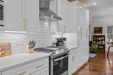 Golf-front elegance meets resort-style living in this on Deercroft Golf and Country Club in North Carolina - for sale on GolfHomes.com, golf home, golf lot