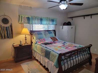 REDUCED! This is a lovely furnished 2 bedroom 2 bath home with on 3 Parks Fairways in Arizona - for sale on GolfHomes.com, golf home, golf lot