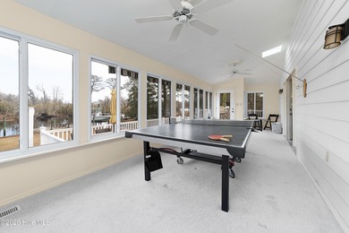 Waterfront living at its finest! This beautiful home offers on River Bend Golf and Country Club in North Carolina - for sale on GolfHomes.com, golf home, golf lot