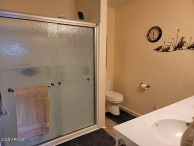 REDUCED! This is a lovely furnished 2 bedroom 2 bath home with on 3 Parks Fairways in Arizona - for sale on GolfHomes.com, golf home, golf lot