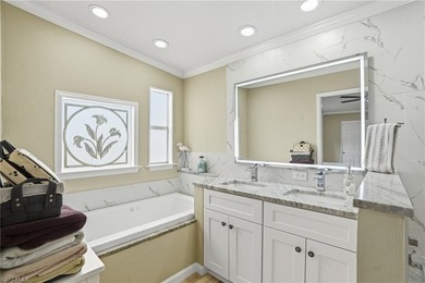 Freshly remodeled from top to bottom, this light-filled home on Pine Lakes Country Club in Florida - for sale on GolfHomes.com, golf home, golf lot