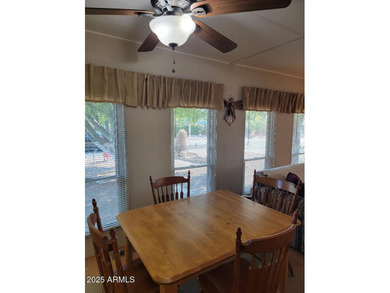 REDUCED! This is a lovely furnished 2 bedroom 2 bath home with on 3 Parks Fairways in Arizona - for sale on GolfHomes.com, golf home, golf lot