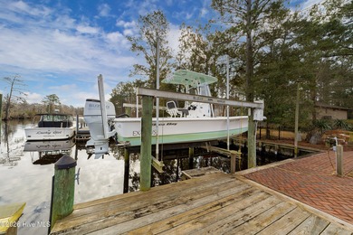 Waterfront living at its finest! This beautiful home offers on River Bend Golf and Country Club in North Carolina - for sale on GolfHomes.com, golf home, golf lot