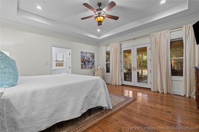 Golf-front elegance meets resort-style living in this on Deercroft Golf and Country Club in North Carolina - for sale on GolfHomes.com, golf home, golf lot