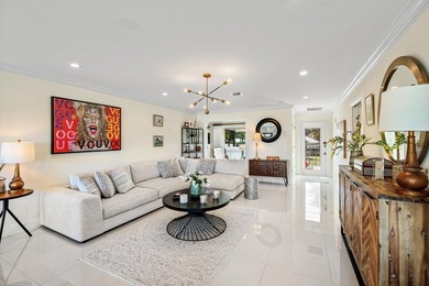 Beautifully reimagined 2-bedroom plus den residence, ideally on Quail Ridge Golf Course and Country Club in Florida - for sale on GolfHomes.com, golf home, golf lot