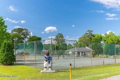 Waterfront living at its finest! This beautiful home offers on River Bend Golf and Country Club in North Carolina - for sale on GolfHomes.com, golf home, golf lot
