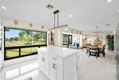 Beautifully reimagined 2-bedroom plus den residence, ideally on Quail Ridge Golf Course and Country Club in Florida - for sale on GolfHomes.com, golf home, golf lot