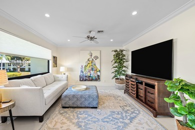 Beautifully reimagined 2-bedroom plus den residence, ideally on Quail Ridge Golf Course and Country Club in Florida - for sale on GolfHomes.com, golf home, golf lot