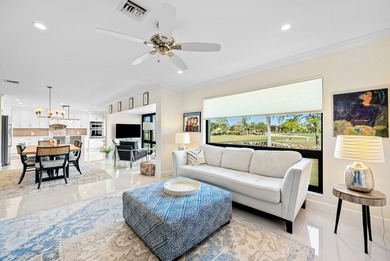 Beautifully reimagined 2-bedroom plus den residence, ideally on Quail Ridge Golf Course and Country Club in Florida - for sale on GolfHomes.com, golf home, golf lot