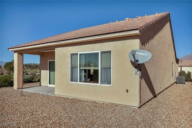 Looking for a single story 2 bedroom home on a golf course in on Aliante Golf Club in Nevada - for sale on GolfHomes.com, golf home, golf lot