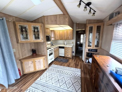 Welcome home to this great park model in desirable Juniper Ridge on Juniper Ridge R.V. Golf Resort in Arizona - for sale on GolfHomes.com, golf home, golf lot