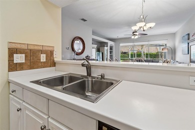 Welcome to 20930 Jaffa Lane in Land O' Lakes, located inside the on The Groves Golf and Country Club in Florida - for sale on GolfHomes.com, golf home, golf lot