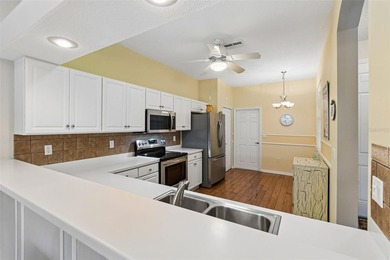 Welcome to 20930 Jaffa Lane in Land O' Lakes, located inside the on The Groves Golf and Country Club in Florida - for sale on GolfHomes.com, golf home, golf lot