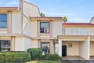 EXCEPTIONAL VALUE for this SPECTACULAR GOLF COURSE TOWNHOME IN on Isla Del Sol Yacht and Country Club in Florida - for sale on GolfHomes.com, golf home, golf lot