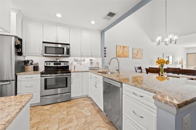 EXCEPTIONAL VALUE for this SPECTACULAR GOLF COURSE TOWNHOME IN on Isla Del Sol Yacht and Country Club in Florida - for sale on GolfHomes.com, golf home, golf lot