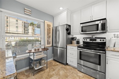 EXCEPTIONAL VALUE for this SPECTACULAR GOLF COURSE TOWNHOME IN on Isla Del Sol Yacht and Country Club in Florida - for sale on GolfHomes.com, golf home, golf lot