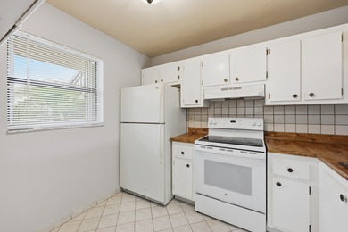 Welcome to 7142 Golf Colony Ct #102 located in Lucerne Lakes on Forest Oaks Golf Club in Florida - for sale on GolfHomes.com, golf home, golf lot