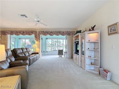 This pristine Ibis II model in HERONS GLEN COUNTRY CLUB sits in on Herons Glen Golf and Country Club in Florida - for sale on GolfHomes.com, golf home, golf lot