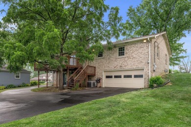 Welcome to this stunning brick ranch perfectly positioned on on Tates Creek Golf Course in Kentucky - for sale on GolfHomes.com, golf home, golf lot