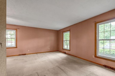 Welcome to this stunning brick ranch perfectly positioned on on Tates Creek Golf Course in Kentucky - for sale on GolfHomes.com, golf home, golf lot