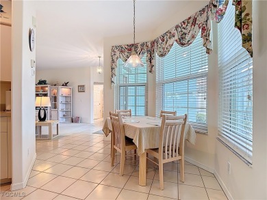 This pristine Ibis II model in HERONS GLEN COUNTRY CLUB sits in on Herons Glen Golf and Country Club in Florida - for sale on GolfHomes.com, golf home, golf lot