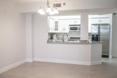 Imagine enjoying your day in a peaceful community with your own on Feather Sound Country Club in Florida - for sale on GolfHomes.com, golf home, golf lot