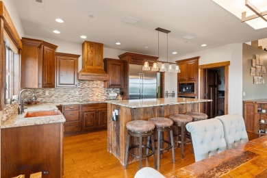 This exceptional home features 6 bedrooms, 4.5 bathrooms, and on Black Bull Golf Community in Montana - for sale on GolfHomes.com, golf home, golf lot