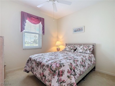 This pristine Ibis II model in HERONS GLEN COUNTRY CLUB sits in on Herons Glen Golf and Country Club in Florida - for sale on GolfHomes.com, golf home, golf lot