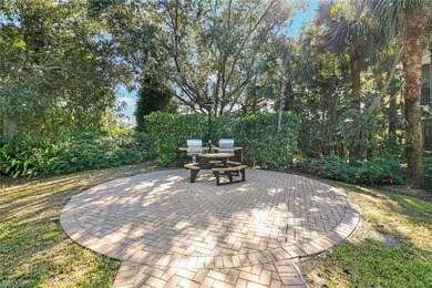 Luxury living in Castillo at Tiburon, this ground-floor end unit on Tiburon Golf Club in Florida - for sale on GolfHomes.com, golf home, golf lot