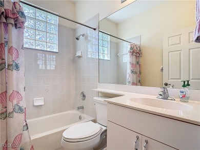 This pristine Ibis II model in HERONS GLEN COUNTRY CLUB sits in on Herons Glen Golf and Country Club in Florida - for sale on GolfHomes.com, golf home, golf lot